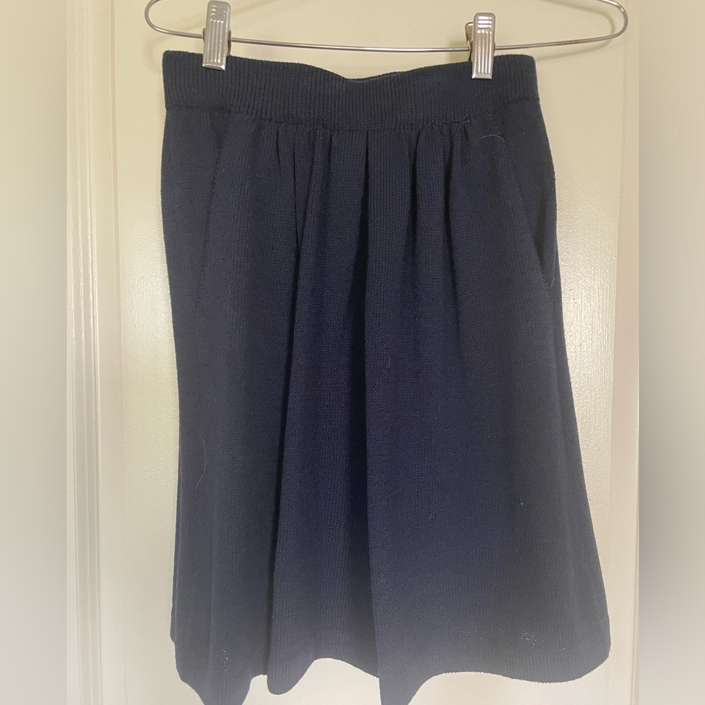 Navy blue shorts. Knit some flex to fabric very useful piece of apparel